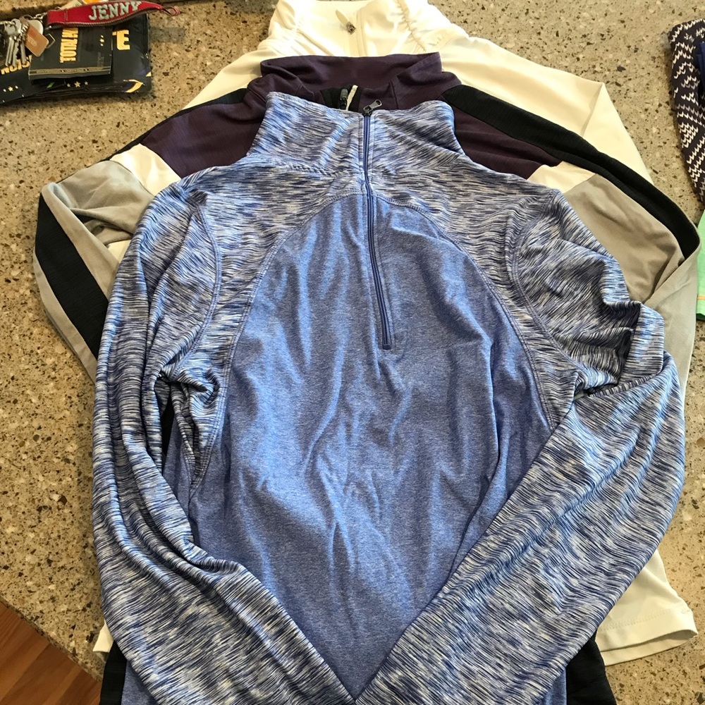Three long sleeve workout 3/4 zips. Size small